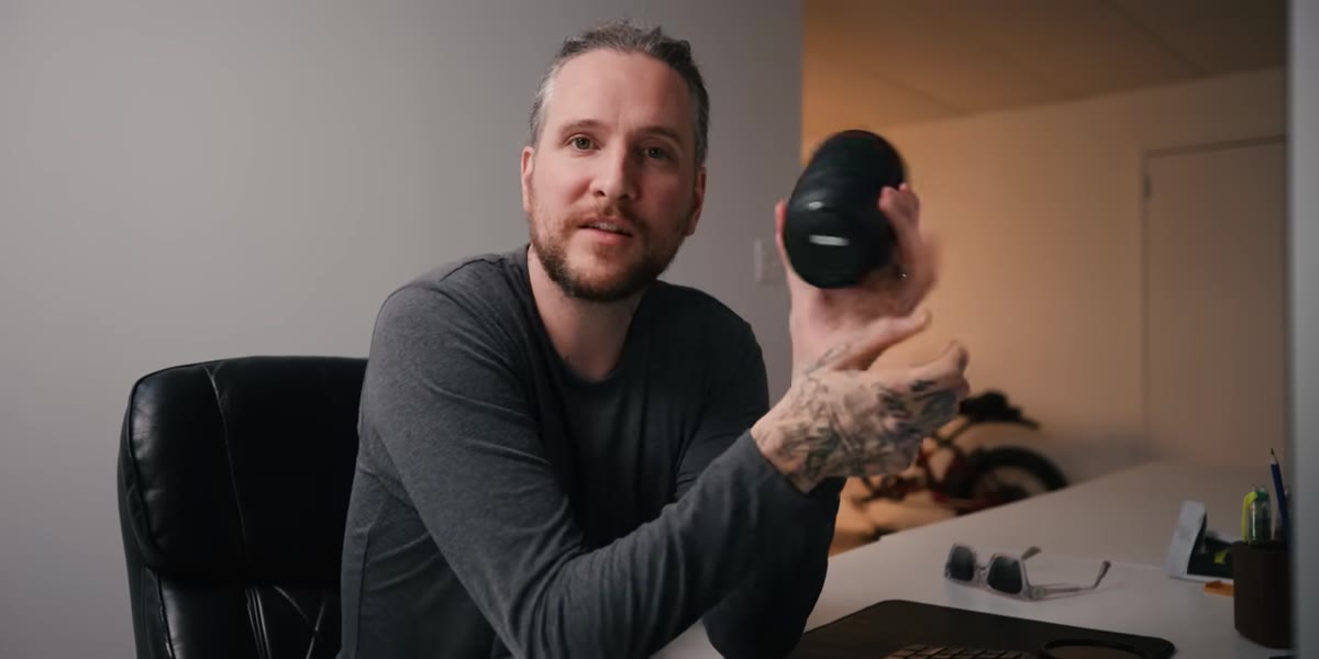 McKinnon pointing out Nano USM motor designation on lens barrel
