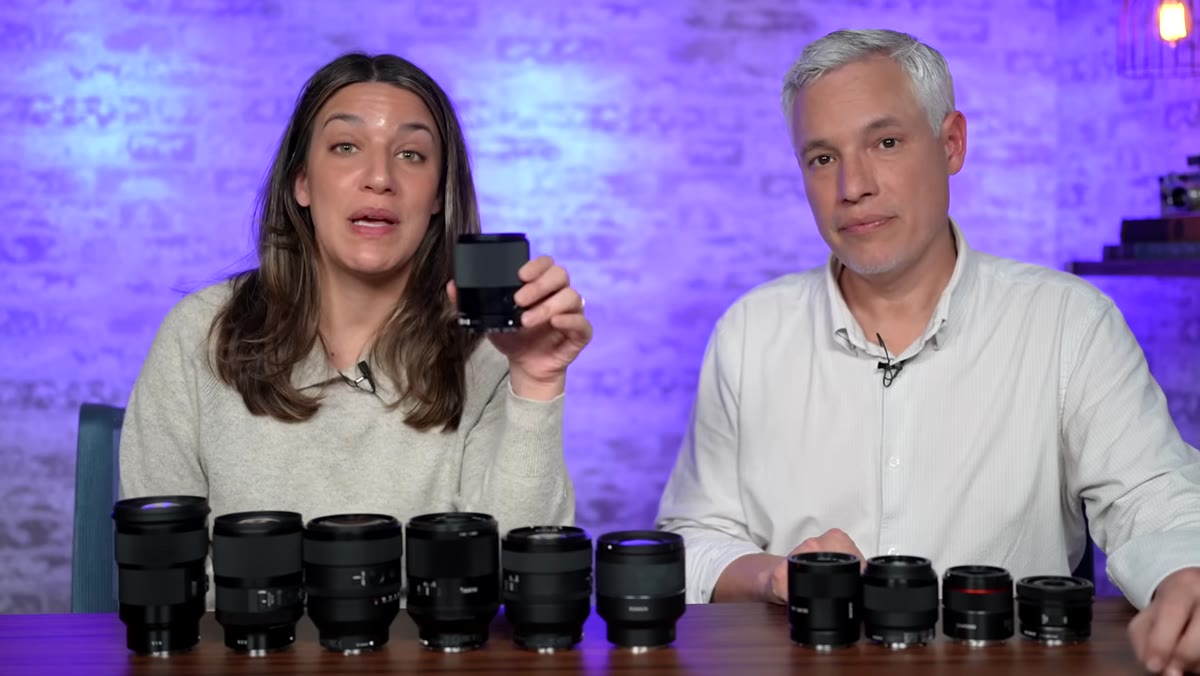 Yongnuo 50mm f/1.8 lens displayed next to camera