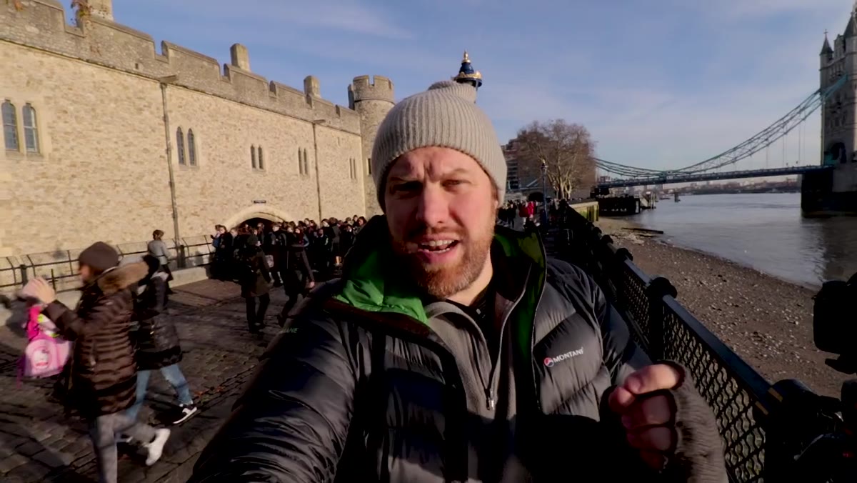 Photographer explaining why wide-angle lenses distort buildings