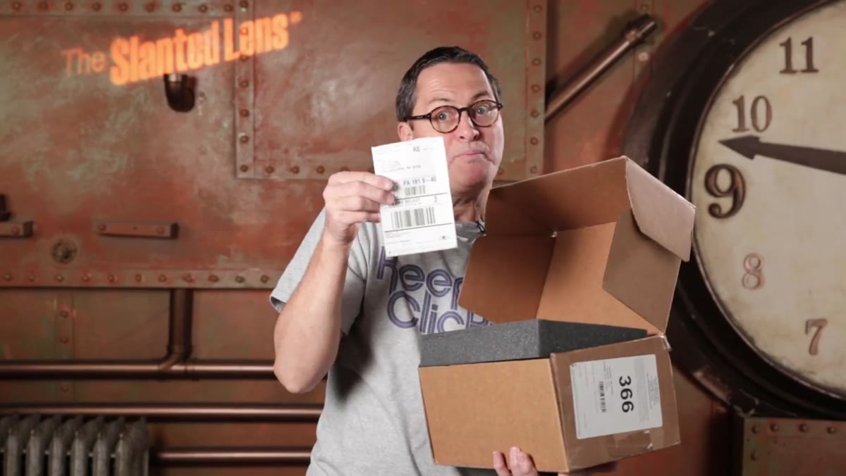 JP showing the prepaid return label on the box