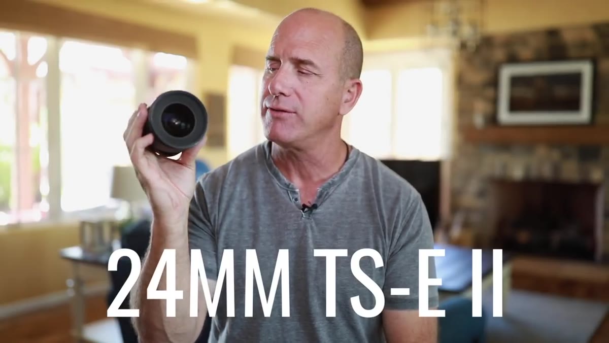 Joel holding the Canon 24mm tilt-shift lens