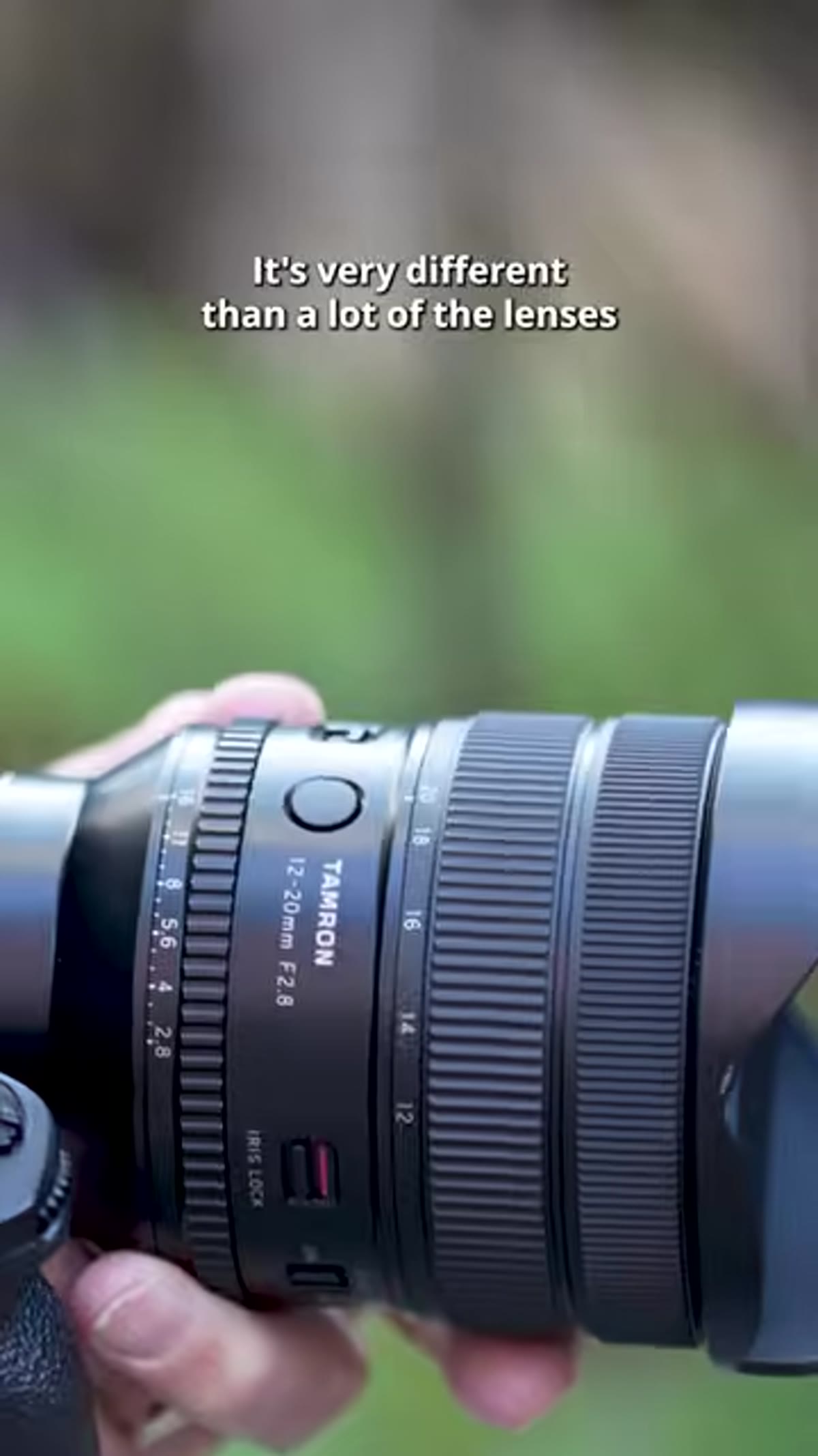 Tamron 12-20mm lens shown against plain background