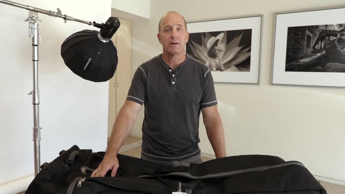 Joel describing the airline counter experience with the golf bag