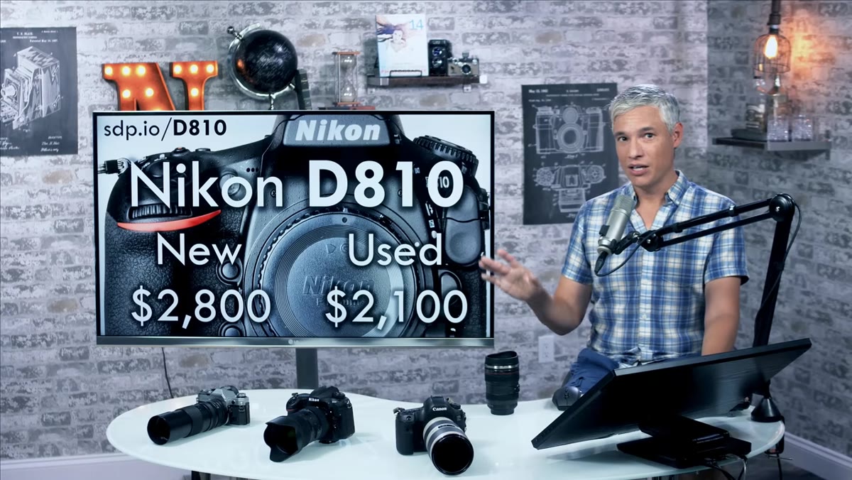 Canon 70-200 f/2.8 new vs used pricing on screen