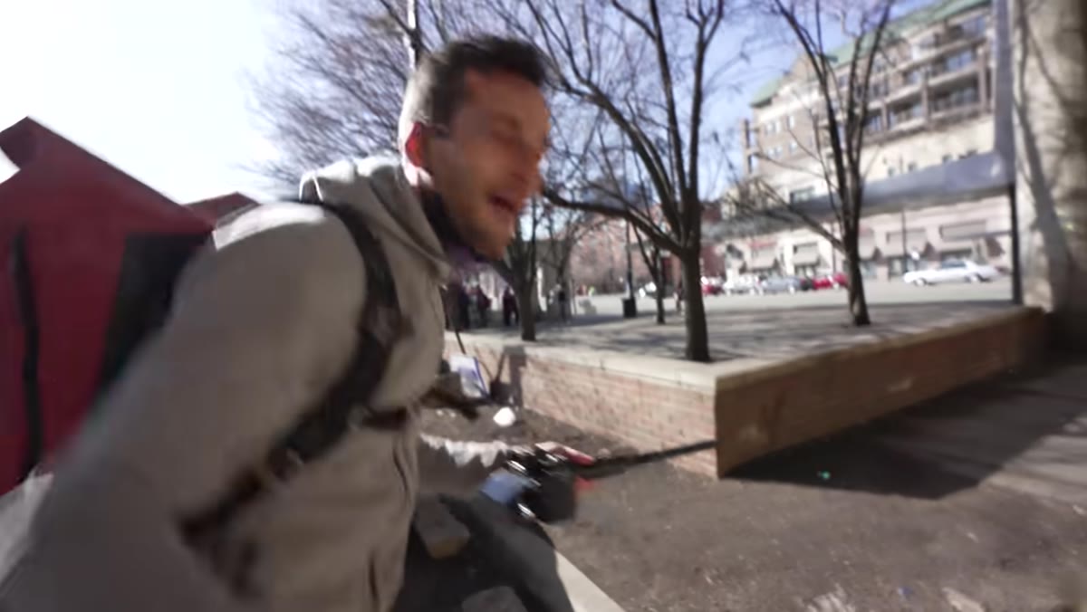 Pierre shooting street scenes through the unusual lens perspective