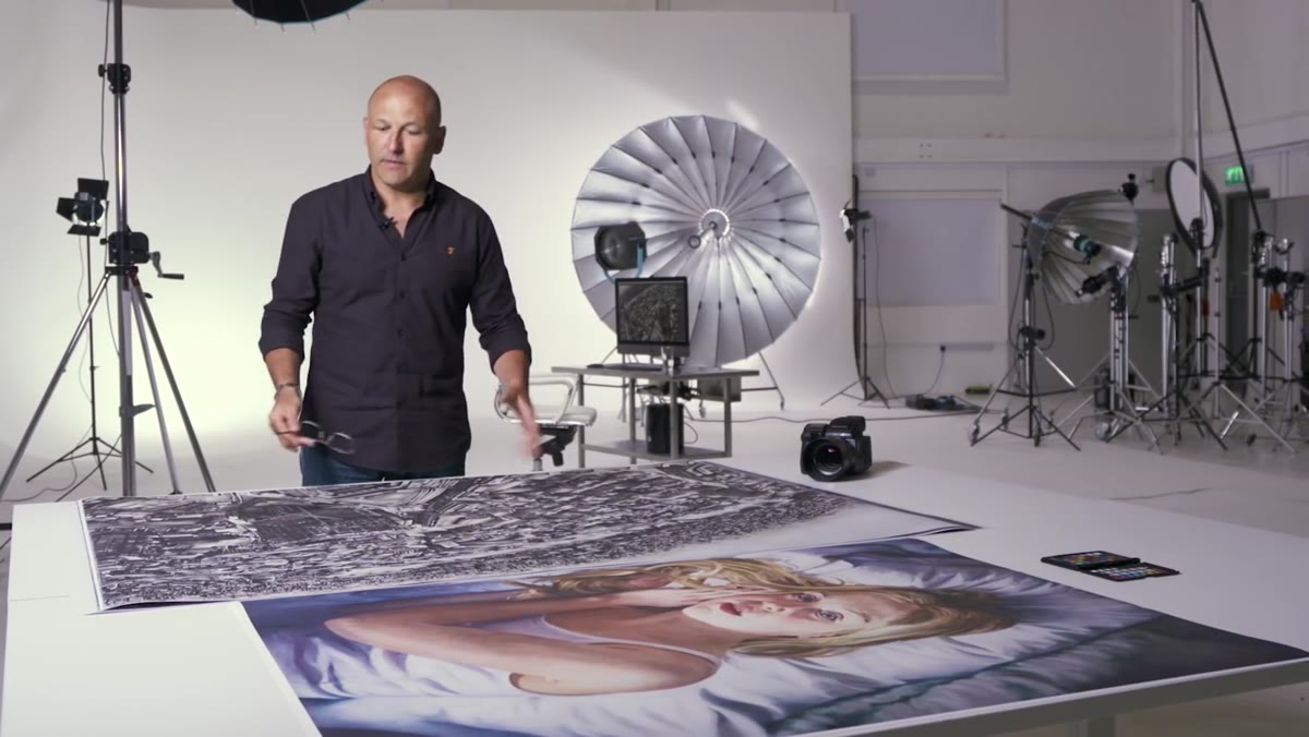 Large format print displayed next to original painting