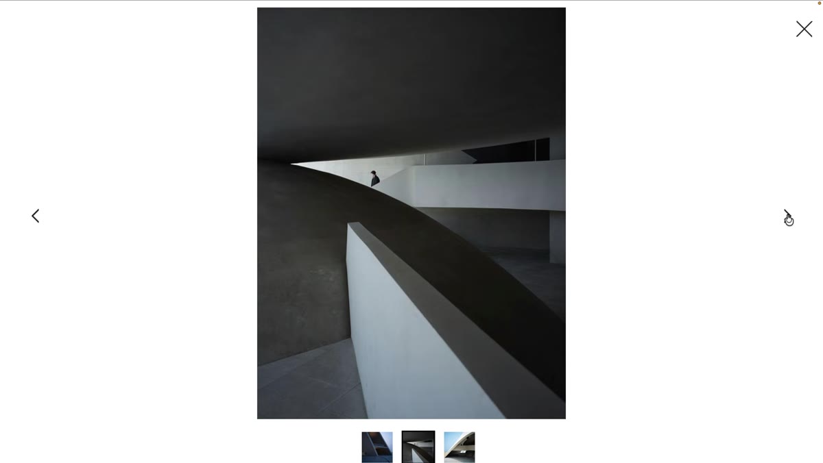 Staircase architecture shot with single figure descending