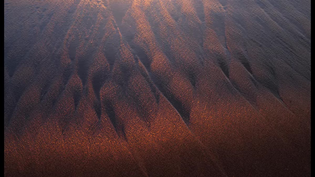 Sand pattern detail shot from above with telephoto compression