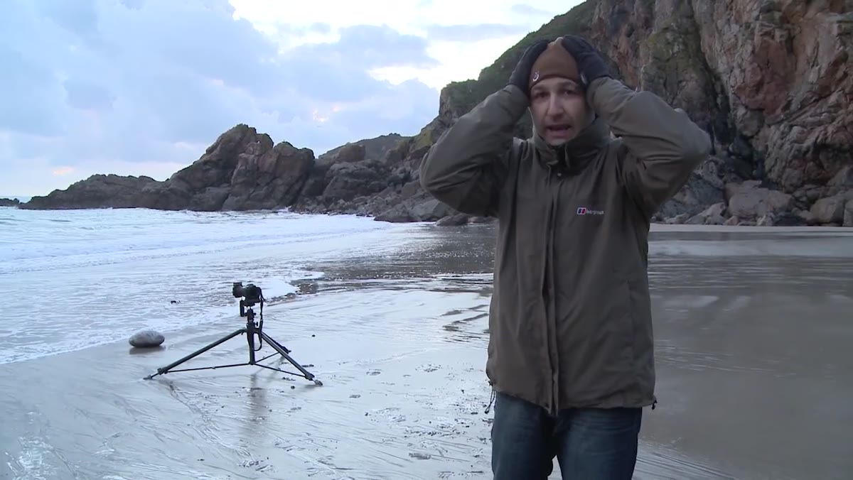Photographer wearing Sealskinz waterproof beanie hat