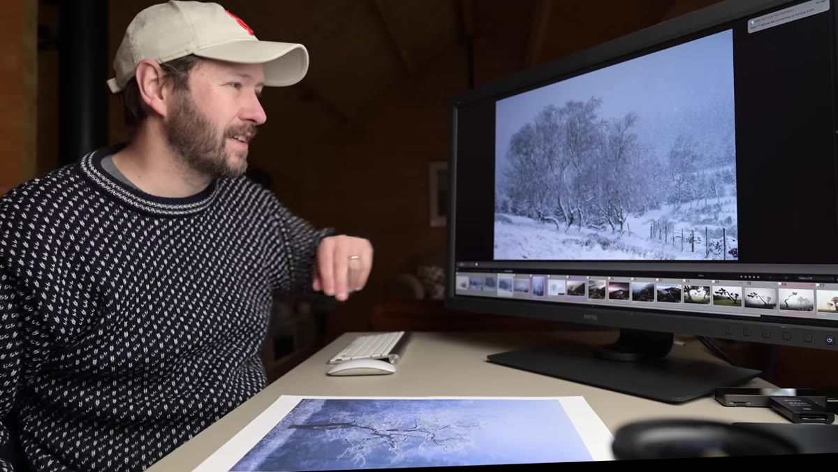 Final snow scene with fence running across lower frame